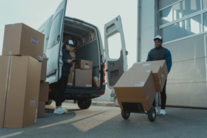Moving company loading boxes